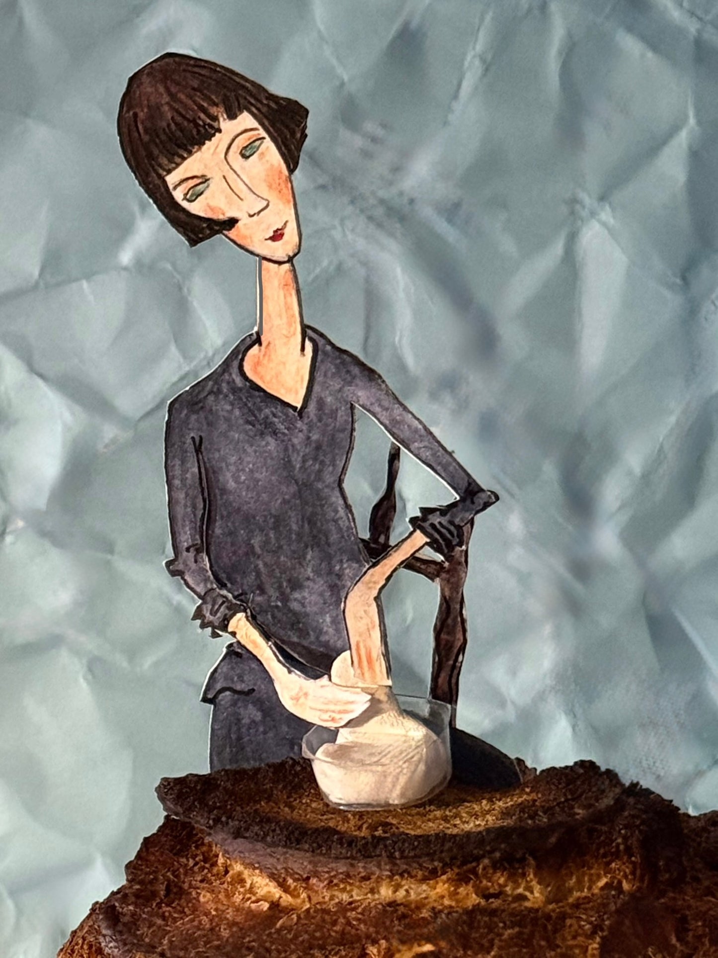 Woman in Blue Dress Making Bread